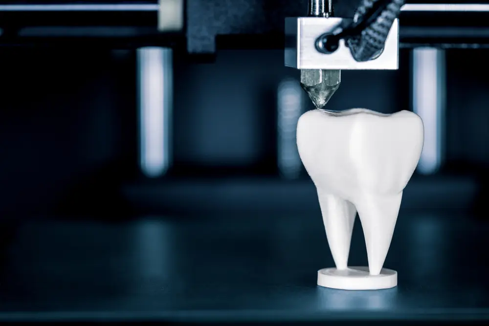 Dental 3D printer, creating items like molds, implants, and prostheses using additive manufacturing.